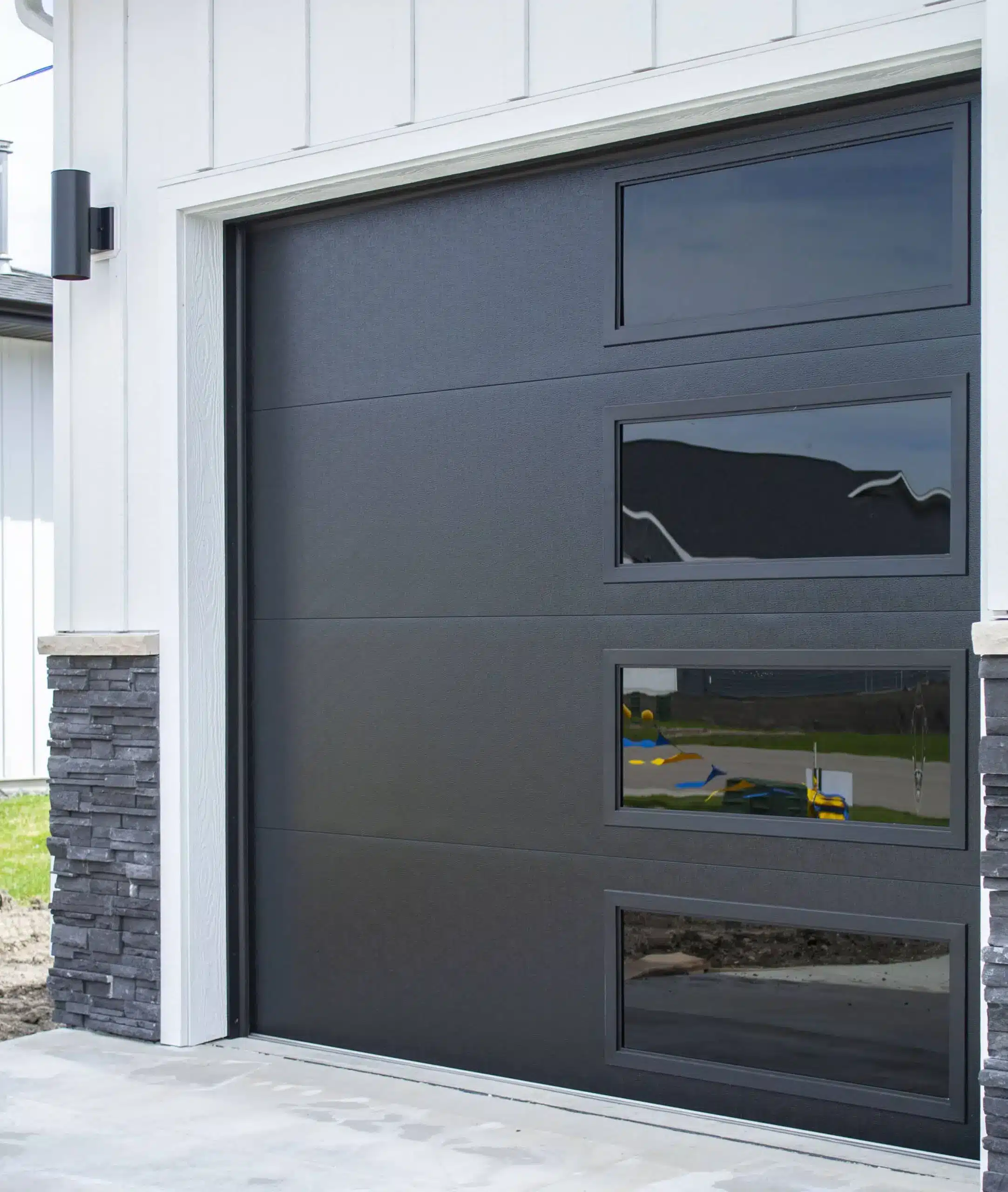 Black flush panel garage door